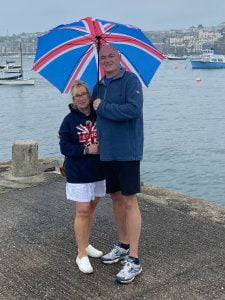 Union Jack golf umbrella being modelled by Tony and Beverley at the seaside!