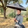 Leslie Storer sporting her new black oriental pagoda umbrella