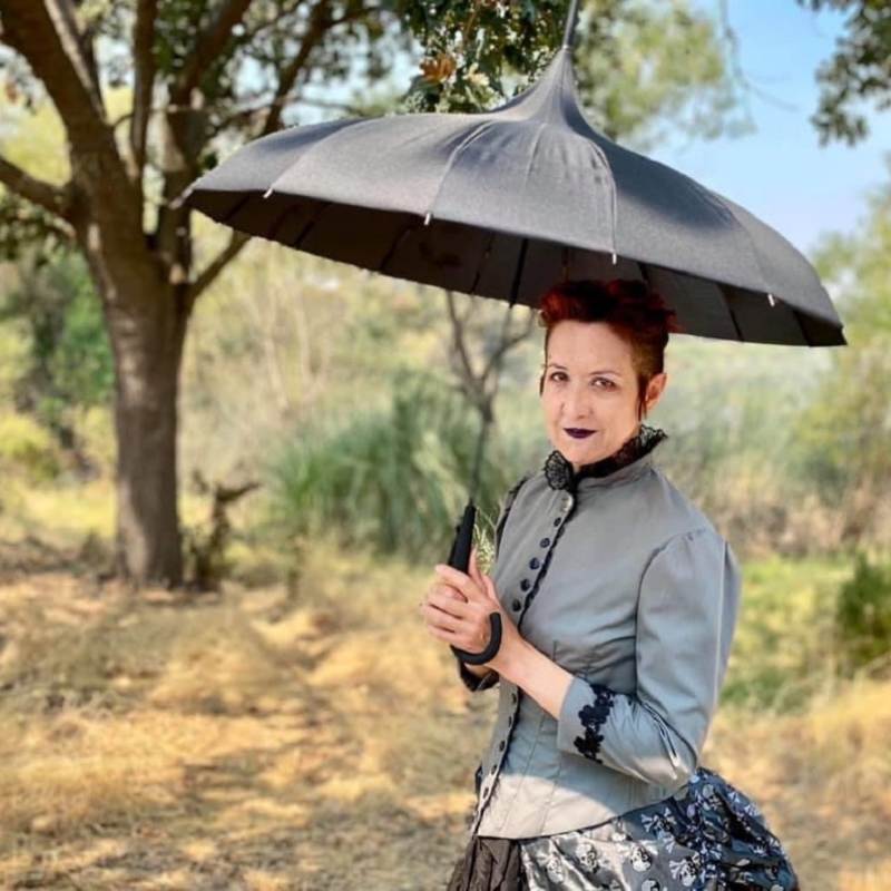 Leslie Storer sporting her new black oriental pagoda umbrella