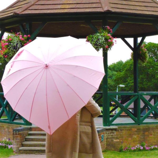 Heart Shaped Umbrellas Soft Pink Heart Shaped Umbrella In The Park