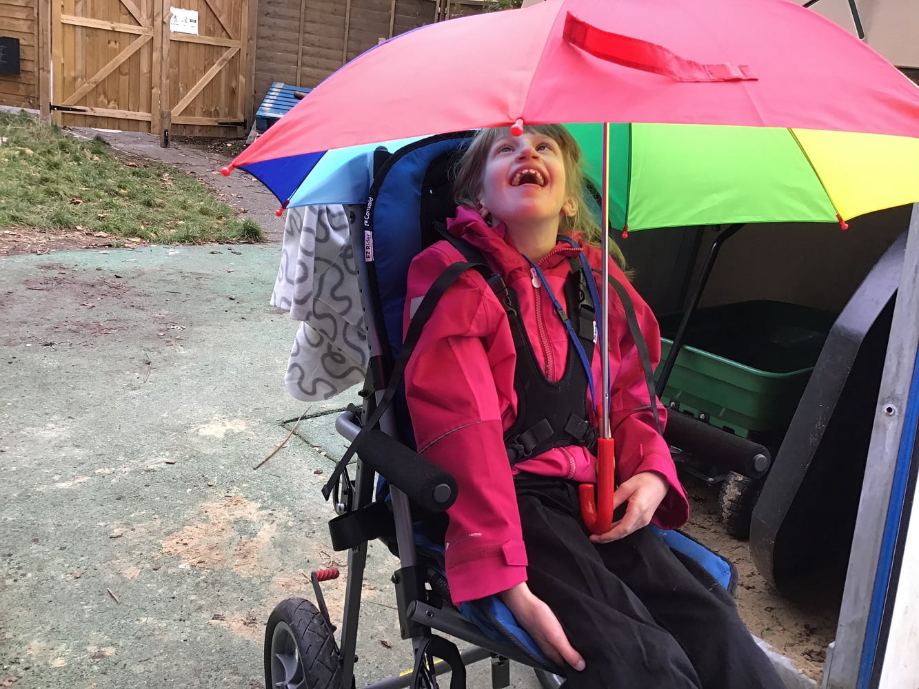 Kids rainbow umbrella with smile