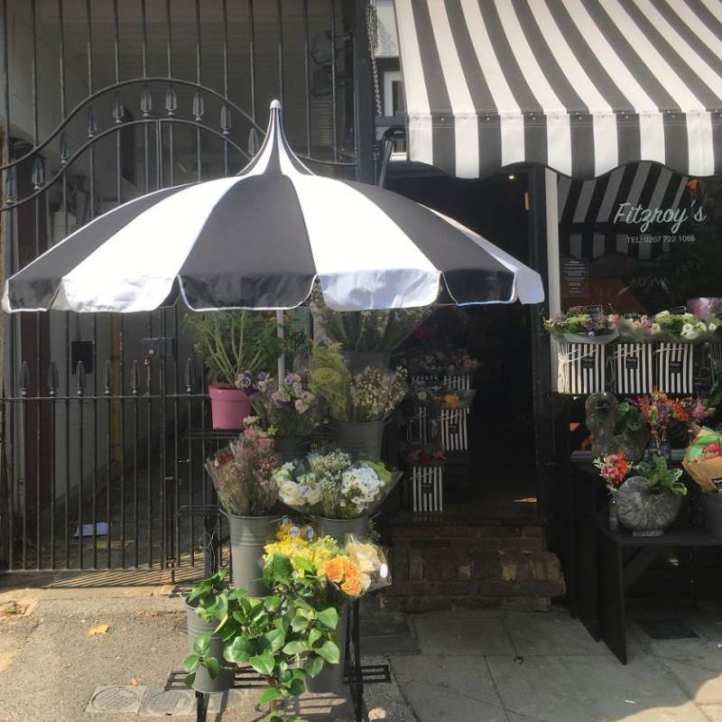 black and white patio pagoda umbrella outside Fitzroys flower shop