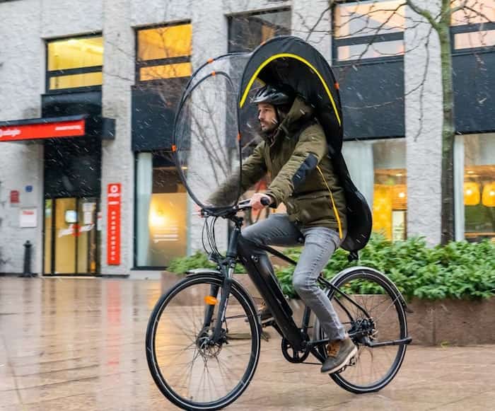 Cycling umbrella - man on bike with Bub-up rain cover
