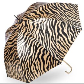 This zebra print umbrella in black and gold stripes is also UV protecive!