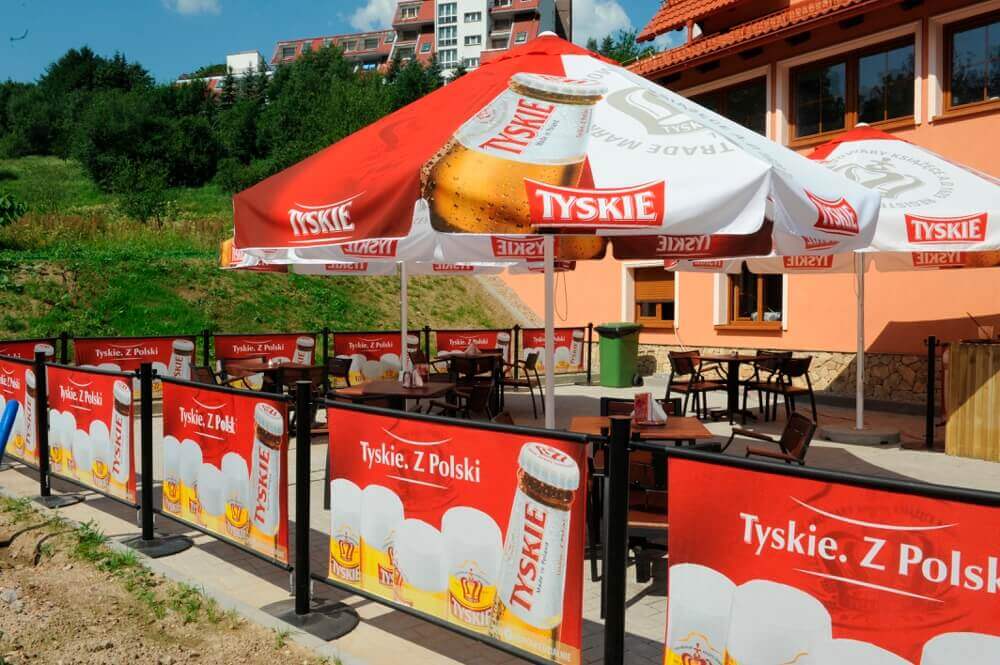 Commercial parasols with all over digitally printed branding.