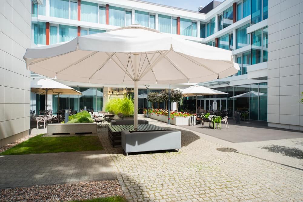 Commercial Parasol with 12 panels in plain white supplied by Umbrella Heaven